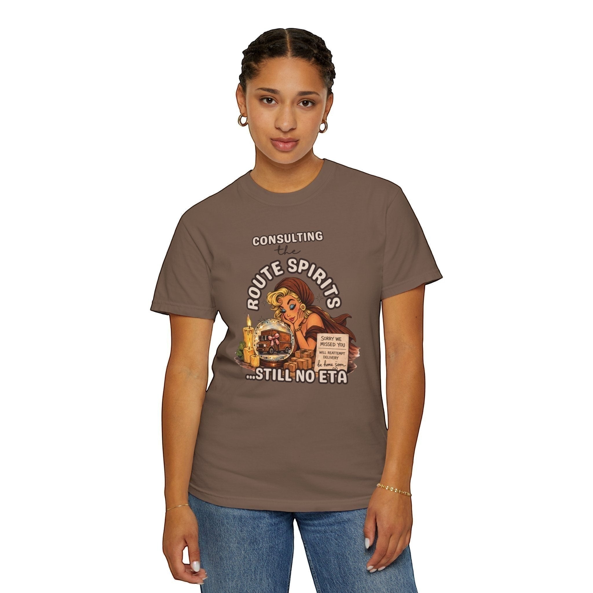Route Society brown cotton graphic tee with "Consulting the Route Spirits...Still No ETA" text and vintage illustration.