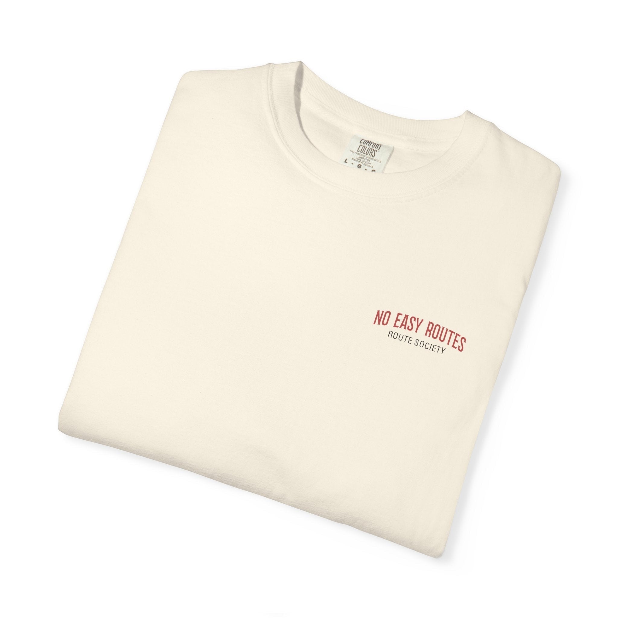 Route Society cream 100% cotton garment-dyed t-shirt with red "No Easy Routes" chest graphic.